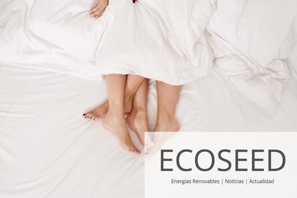 woman in white dress lying on white bed