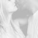 grayscale photography of man and woman kissing