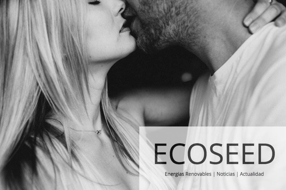 grayscale photography of man and woman kissing