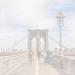 people walking on bridge under cloudy sky during daytime