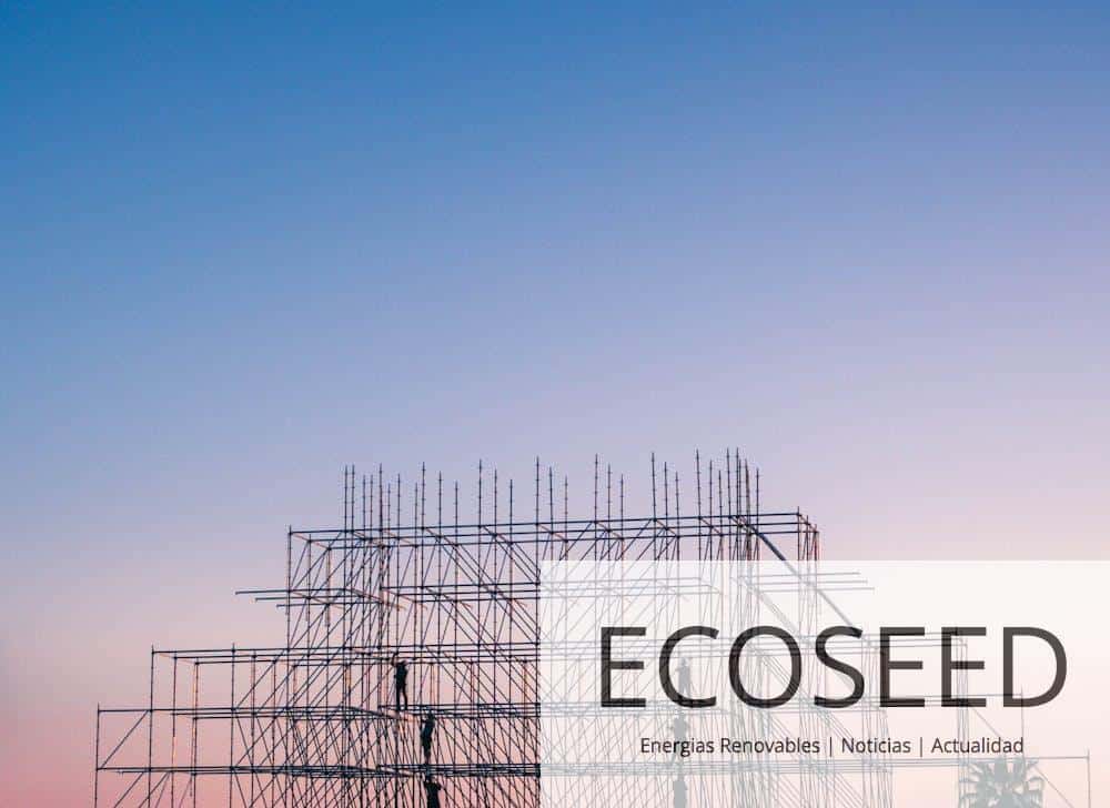 A silhouetted structure against a colorful sunset, showcasing industrial scaffolding in Sochi, Russia.