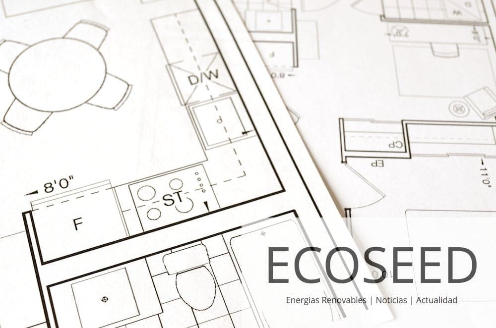 Close-up view of an architectural floor plan on paper showcasing detailed room layouts and measurements.